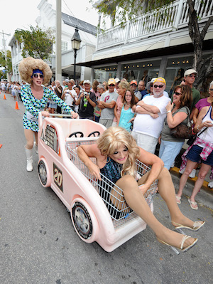 The participants also get a "diva-style" ride down Duval Street in shopping carts propelled by local male dancers. 